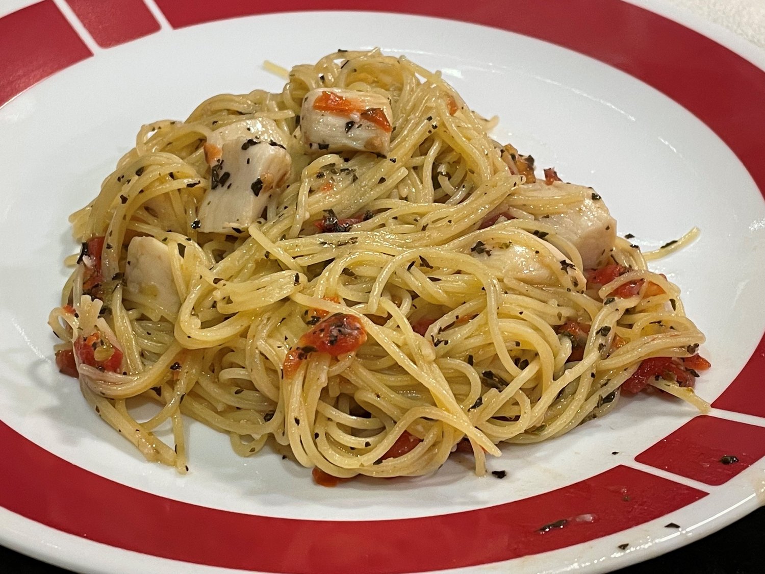 Angel Hair Pasta with Scallops and Spicy Tomato Sauce