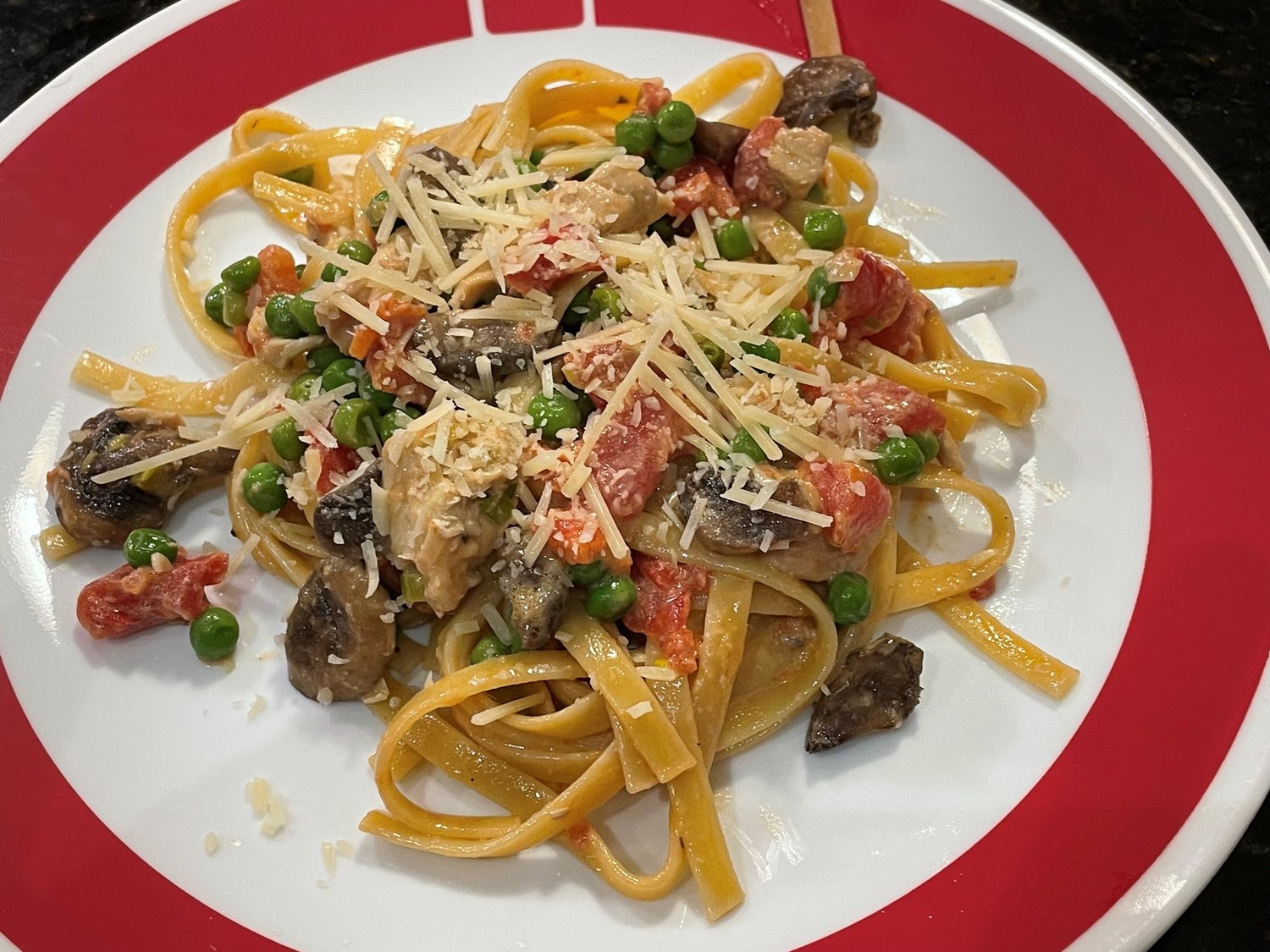 Creamy Chicken, Mushroom, and Tomato Fettuccine